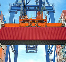 A Crane Lifting a Container
